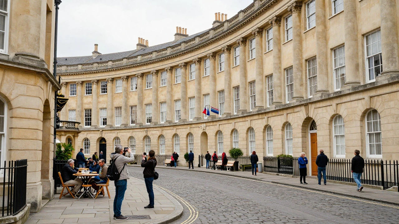 Tourists sightseeing in Bath's Georgian streets and Roman Baths area